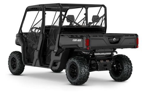 a person riding on the back of a truck